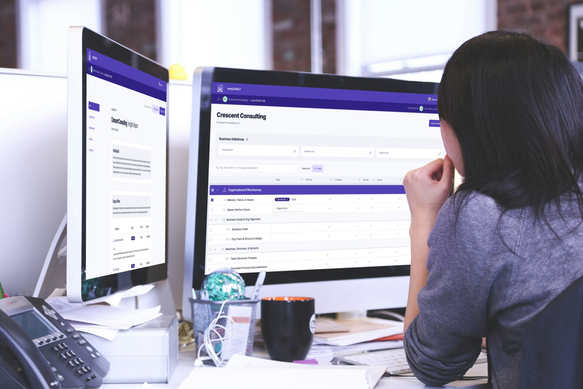 Woman looking at web app on computer screen